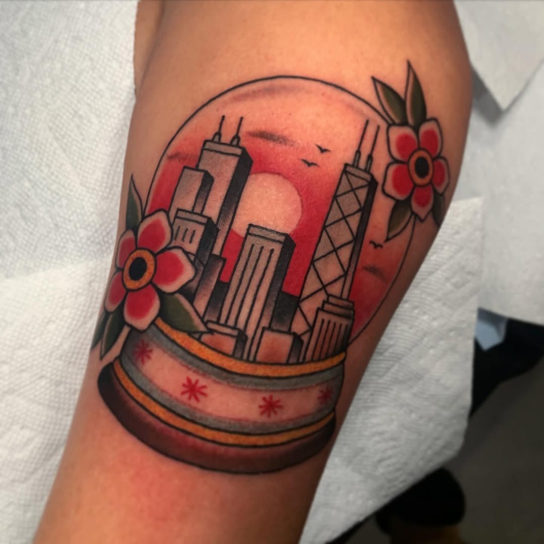 Charming skyline tattoo within a snow globe
