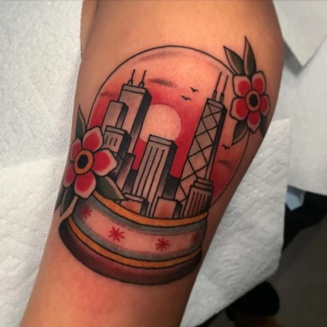 Charming skyline tattoo within a snow globe