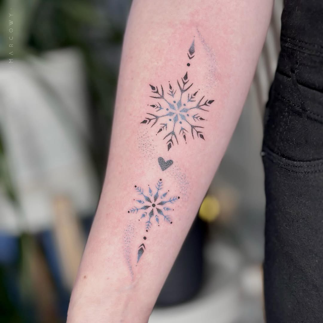 Intricate snowflake tattoo design for winter lovers