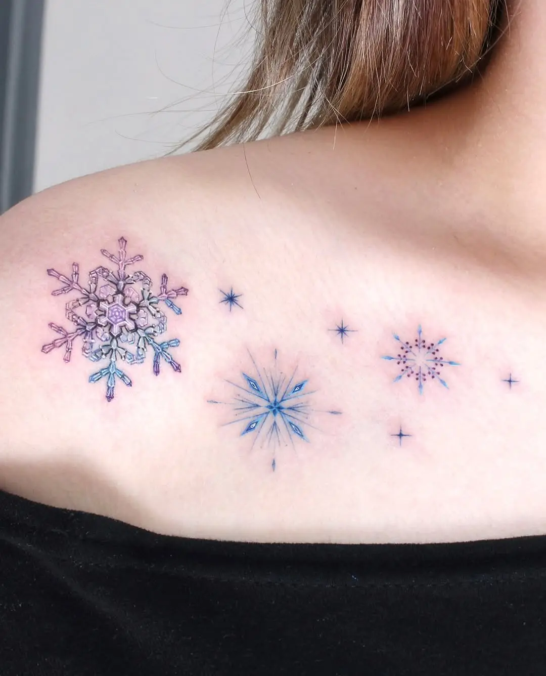Intricate snowflake tattoo designs for winter lovers