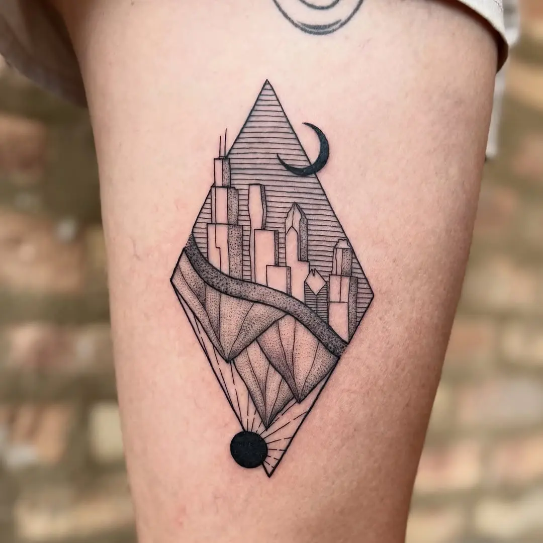 Geometric skyline tattoo with celestial elements