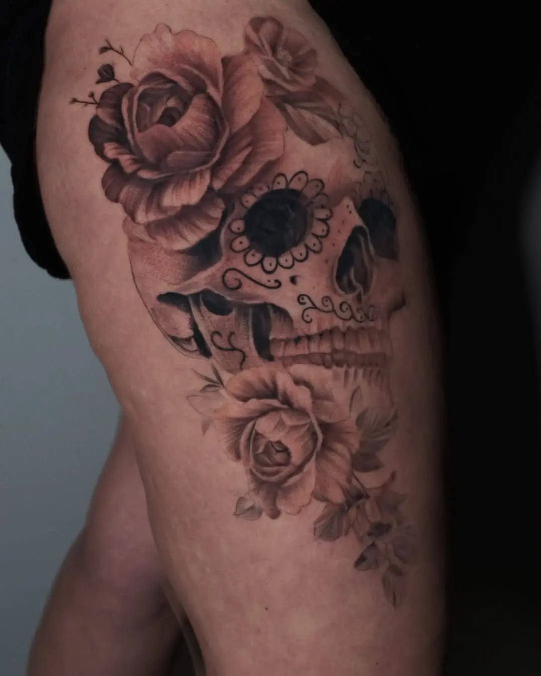 Elegant sugar skull adorned with blooming roses