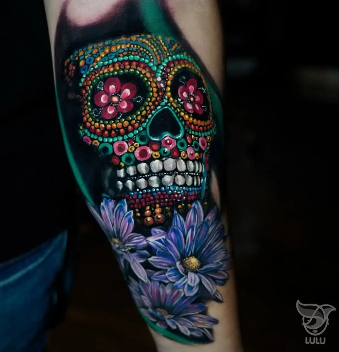 Vibrant Sugar Skull Tattoo with Floral Details