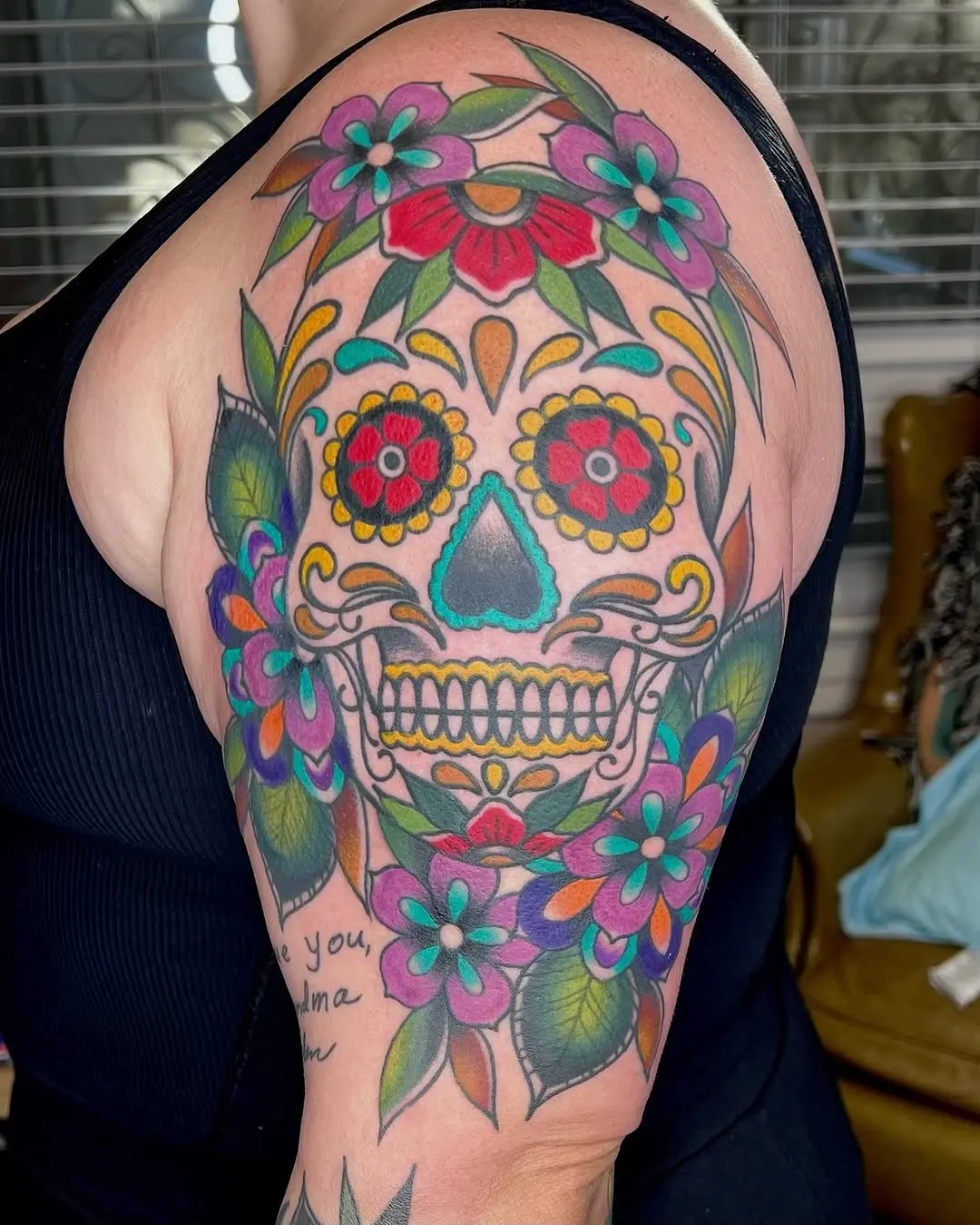 Vibrant sugar skull adorned with floral elements
