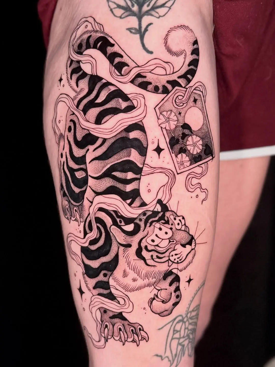 Dynamic tiger with flowing abstract elements