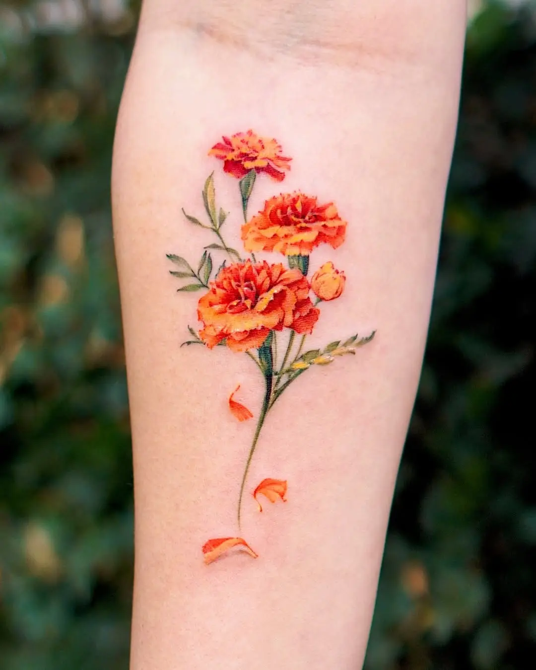 Stunning Marigold Tattoo with Lush Orange Blooms