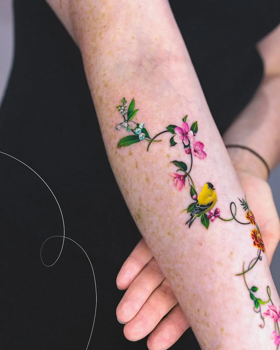 Floral and Bird Vine Tattoo on Arm
