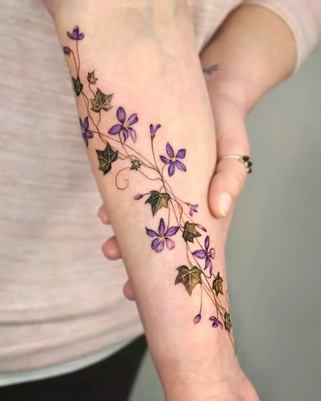 Elegant Violet Floral Tattoo Design