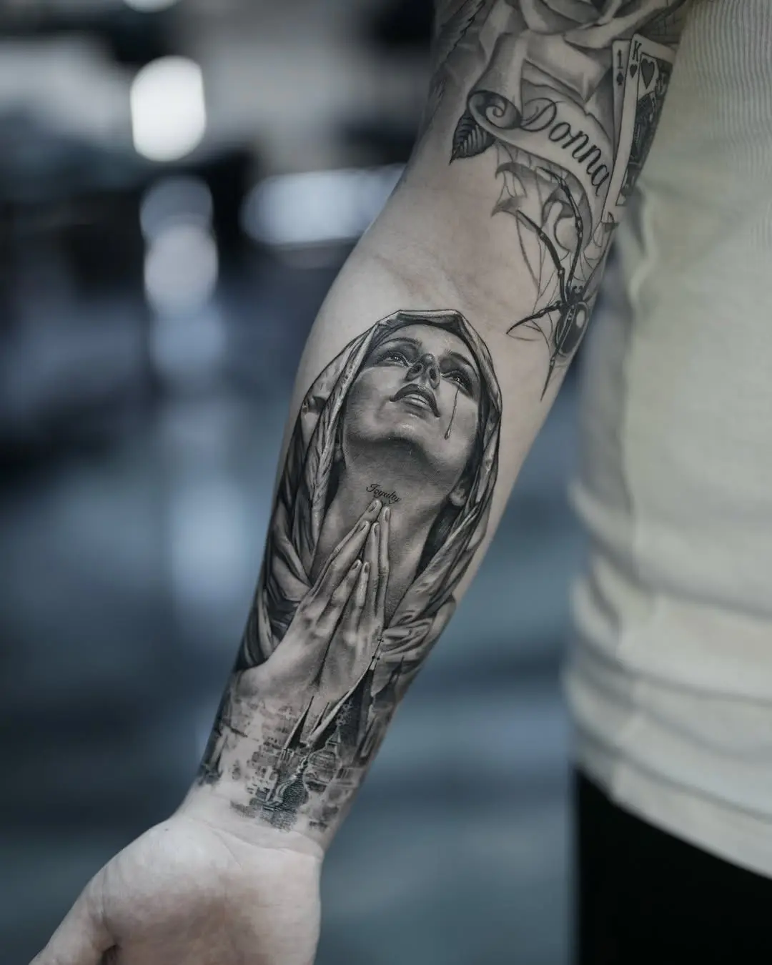 Stunning Virgin Mary Tattoo in Praying Pose