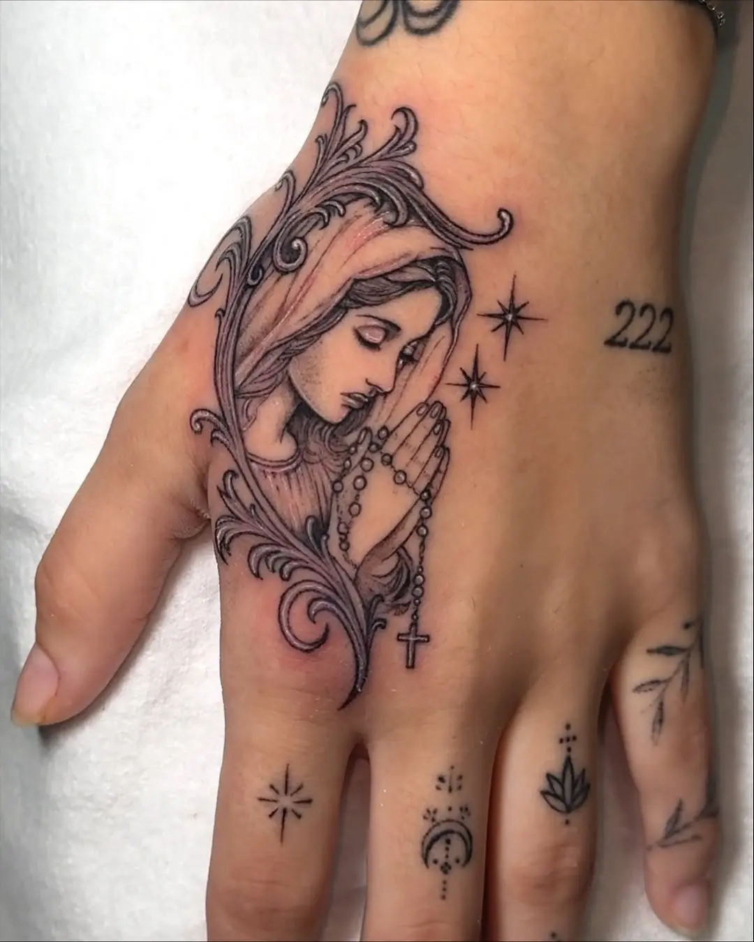 Intricate Virgin Mary Tattoo with Rosary Beads