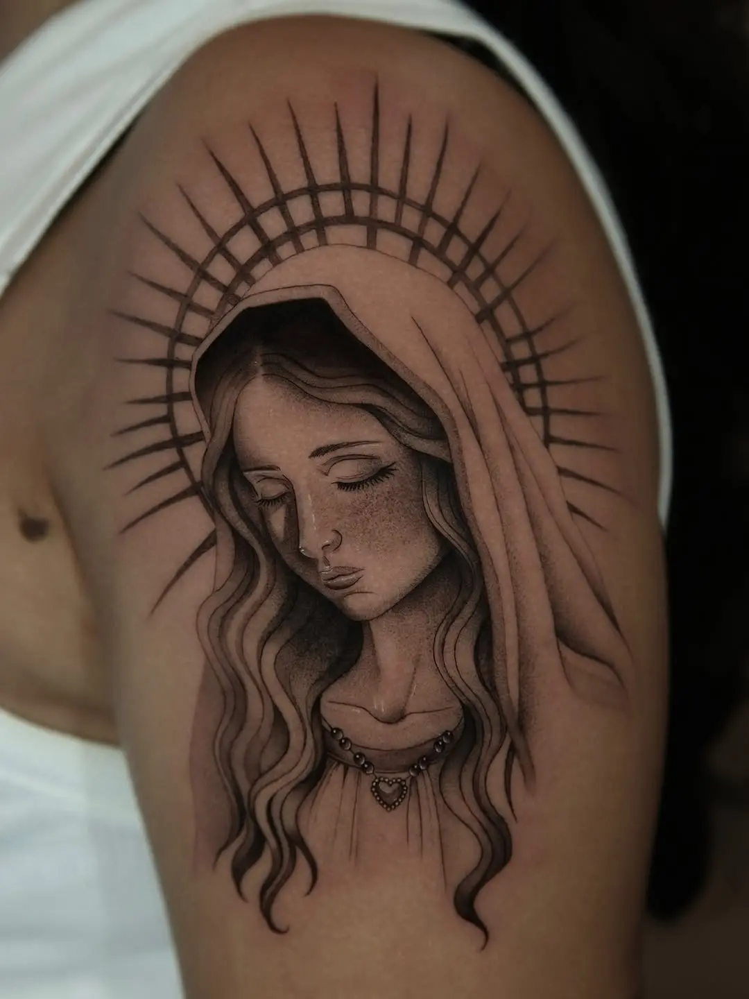 Stunning Virgin Mary Tattoo Design in Monochrome