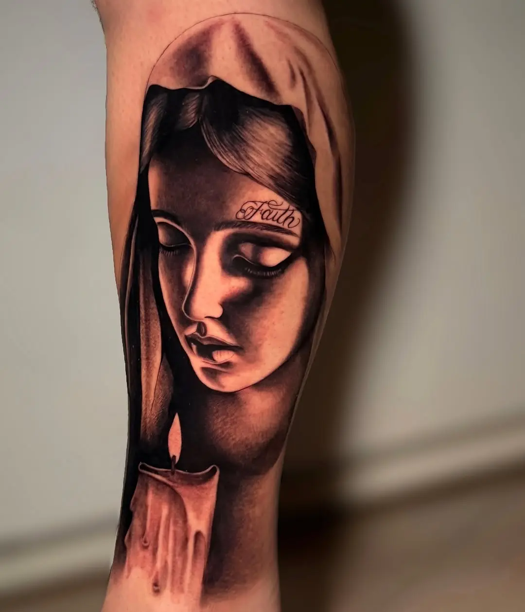 Elegant Virgin Mary Tattoo with Candle