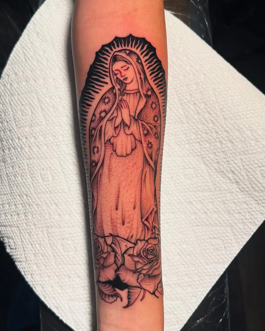 Detailed Virgin Mary Tattoo with Roses