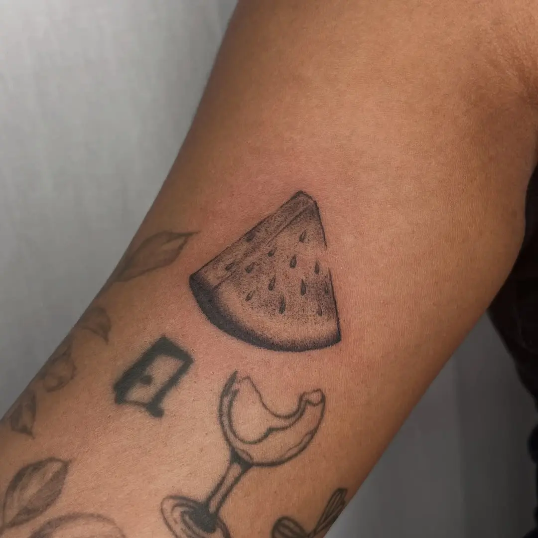 Fresh Watermelon Slice Tattoo in Negative Space