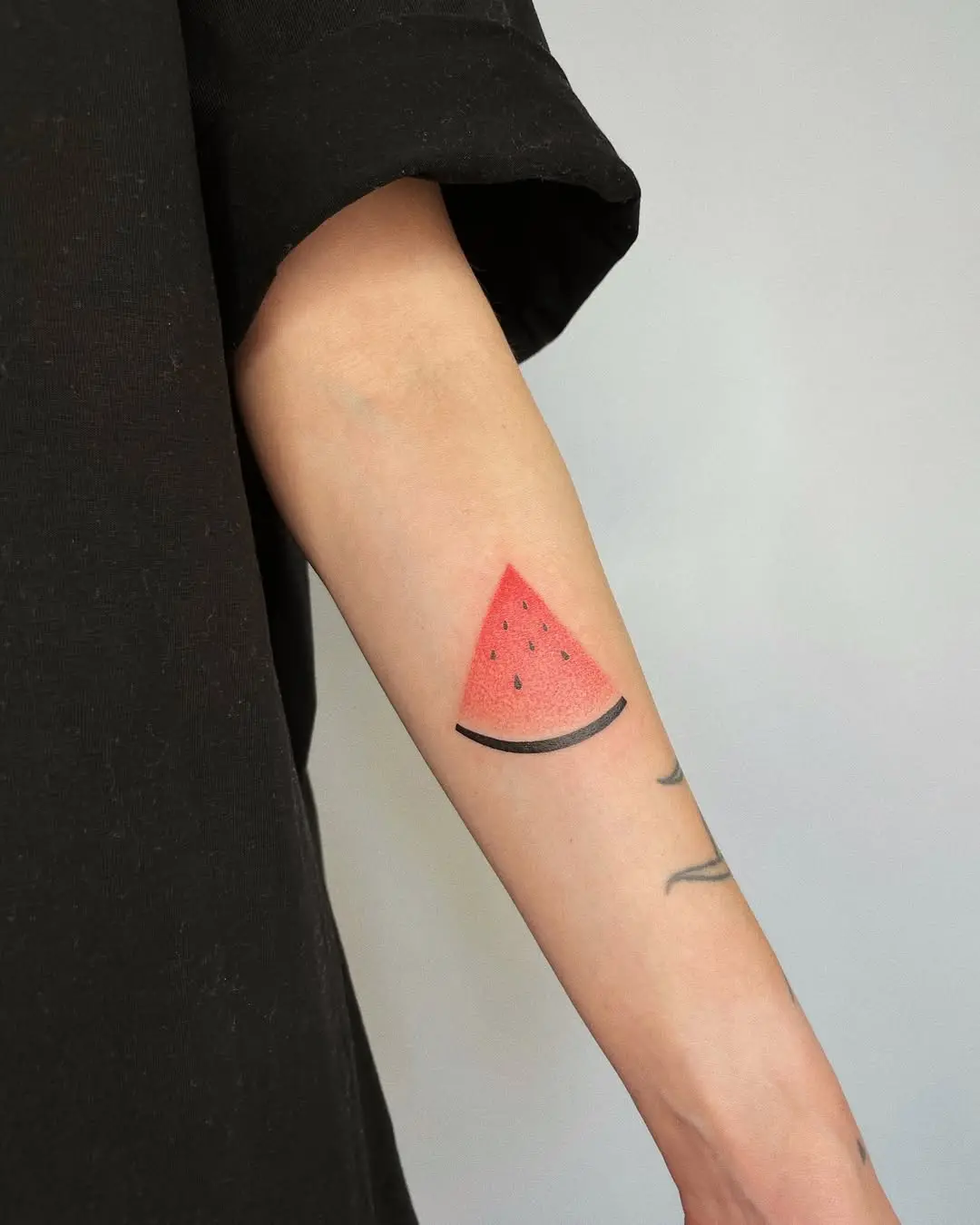 Chic Watermelon Slice Tattoo on Forearm
