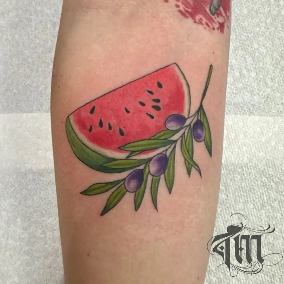 Colorful watermelon tattoo with olive details