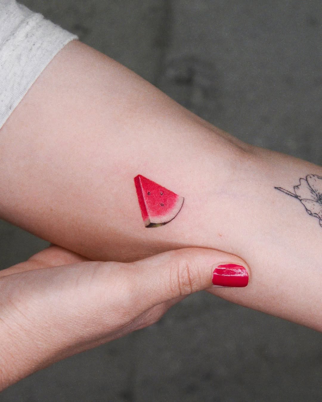Vibrant Watermelon Slice Tattoo on Skin