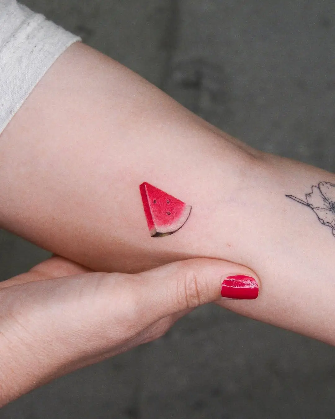 Vibrant Watermelon Slice Tattoo on Skin