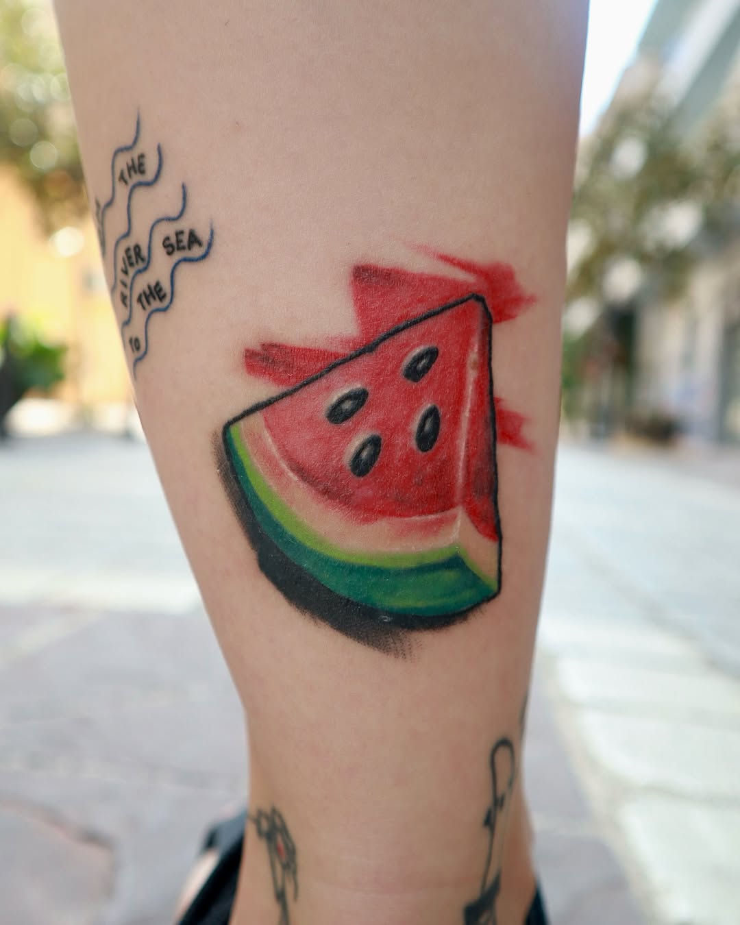 Vibrant Watermelon Tattoo on the Leg