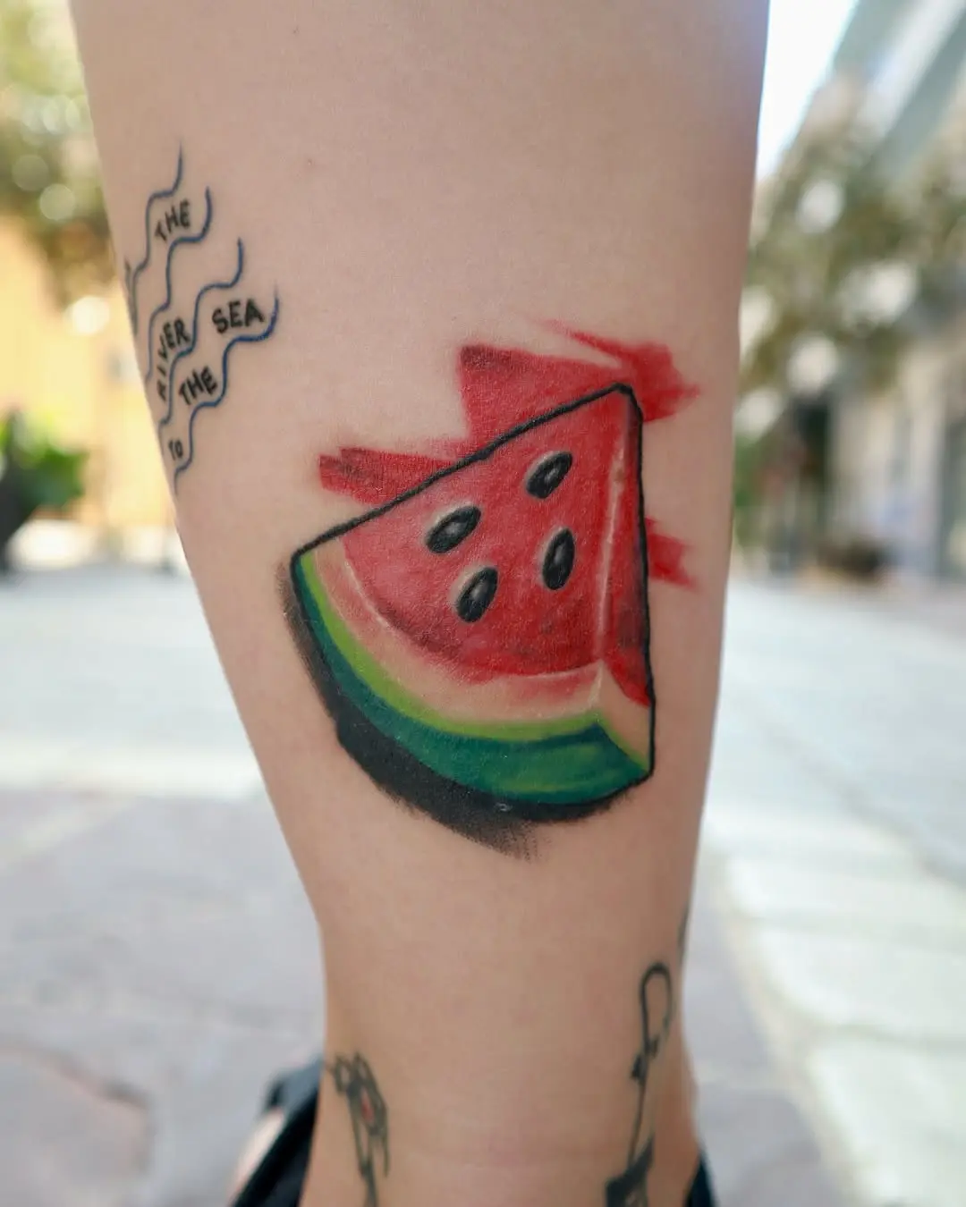 Vibrant Watermelon Tattoo on the Leg