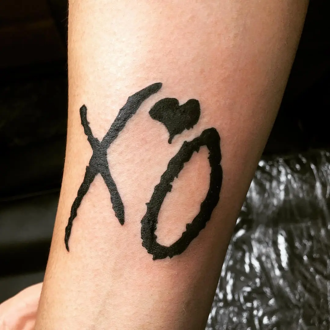 Bold XO Tattoo for Affectionate Expression
