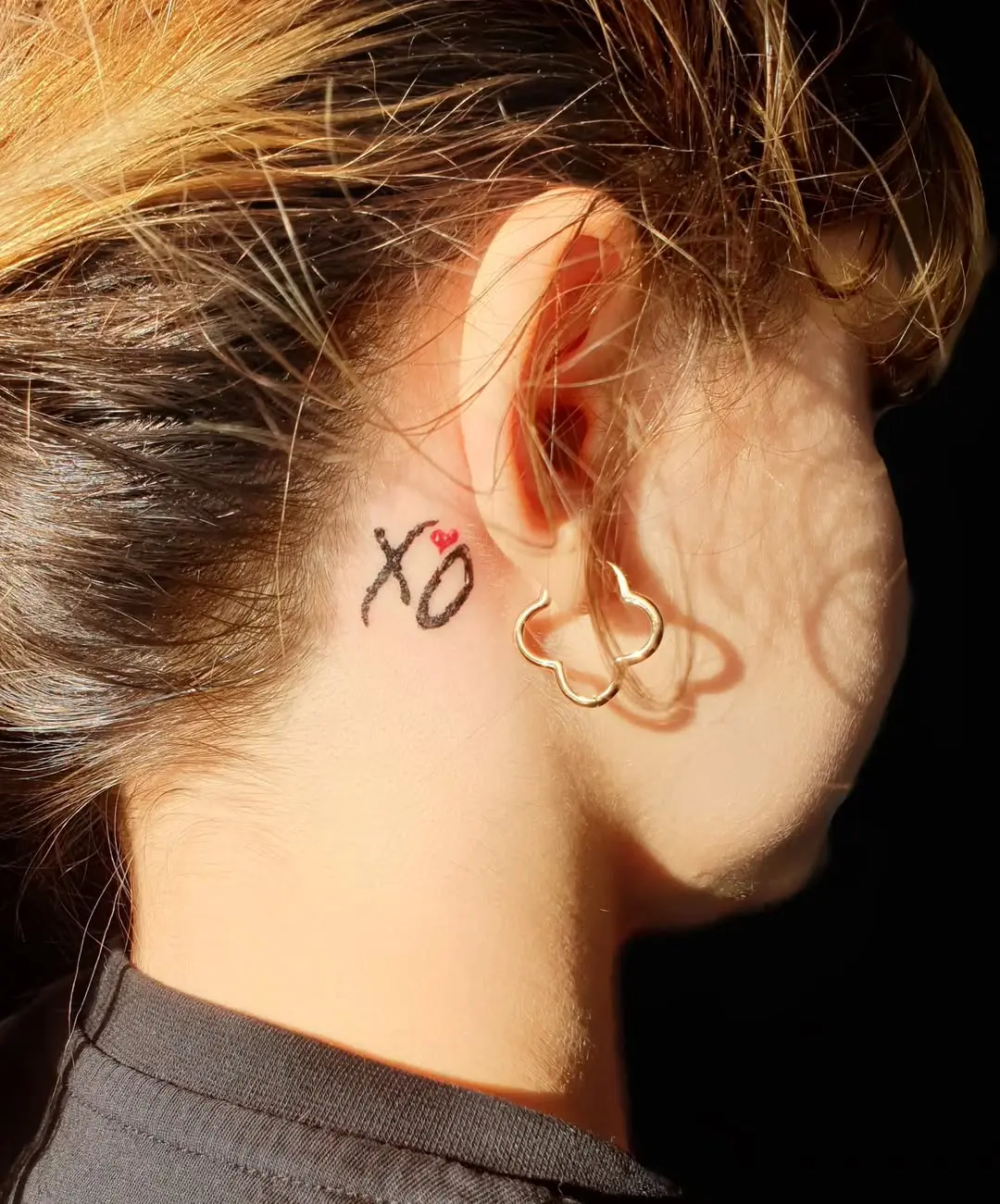 Charming XO Tattoo Behind the Ear