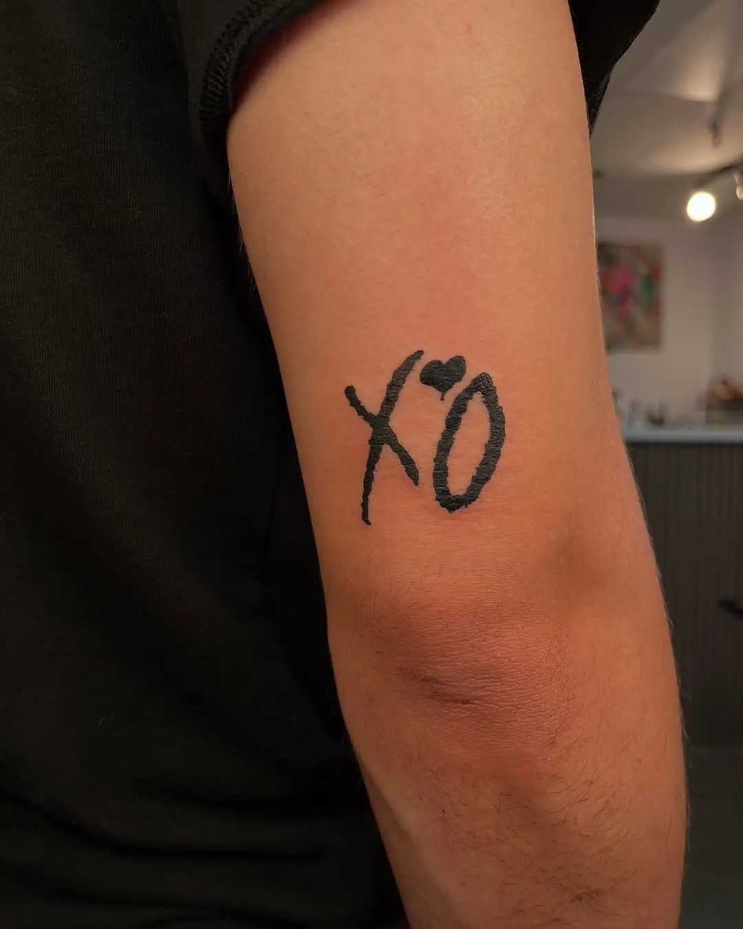 Unique XO Tattoo Design on Arm