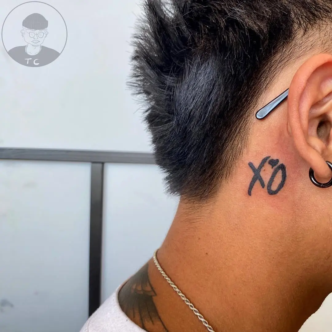 Minimalist XO Tattoo on Neck