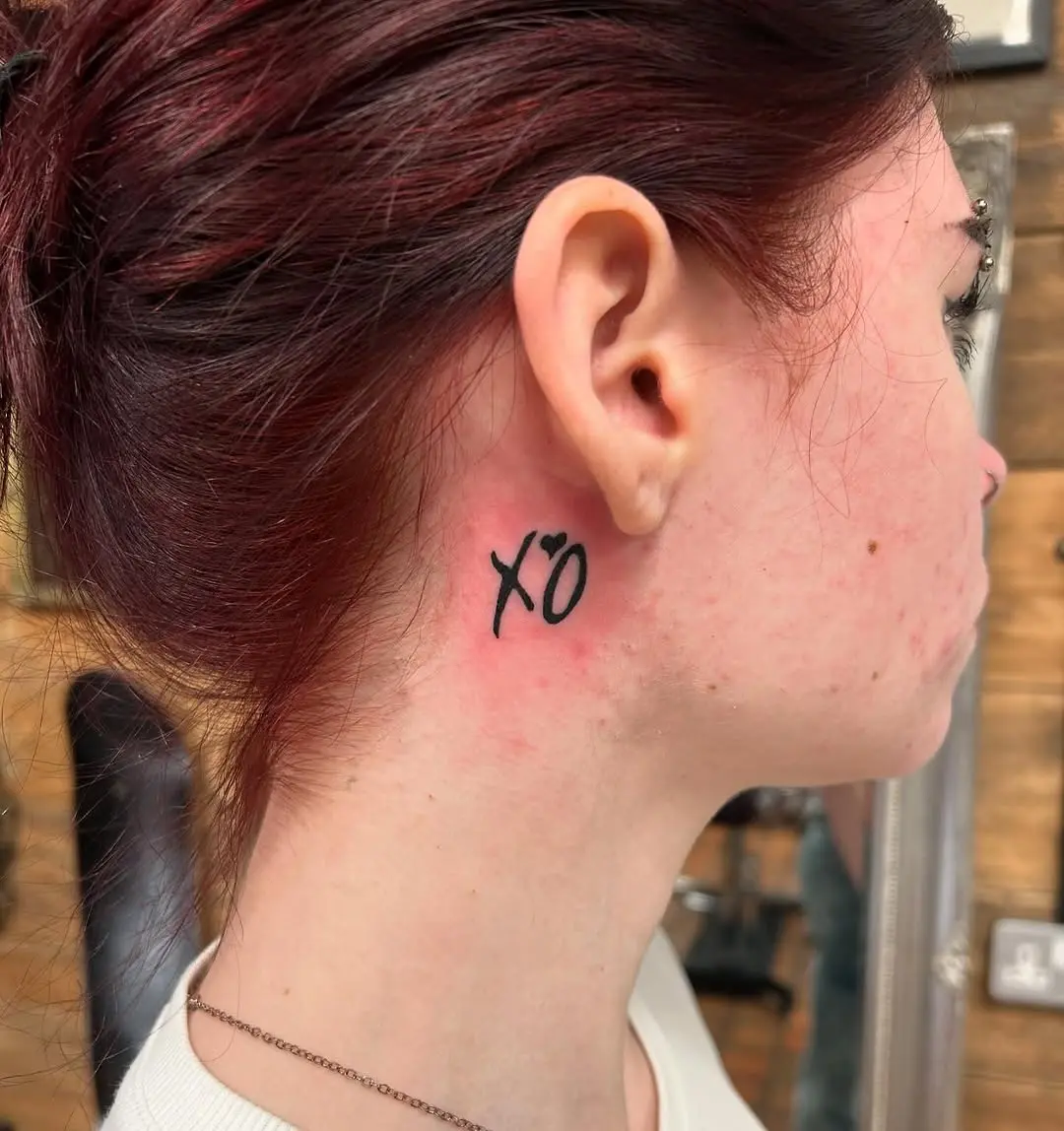 XOXO Tattoo Next to the Ear