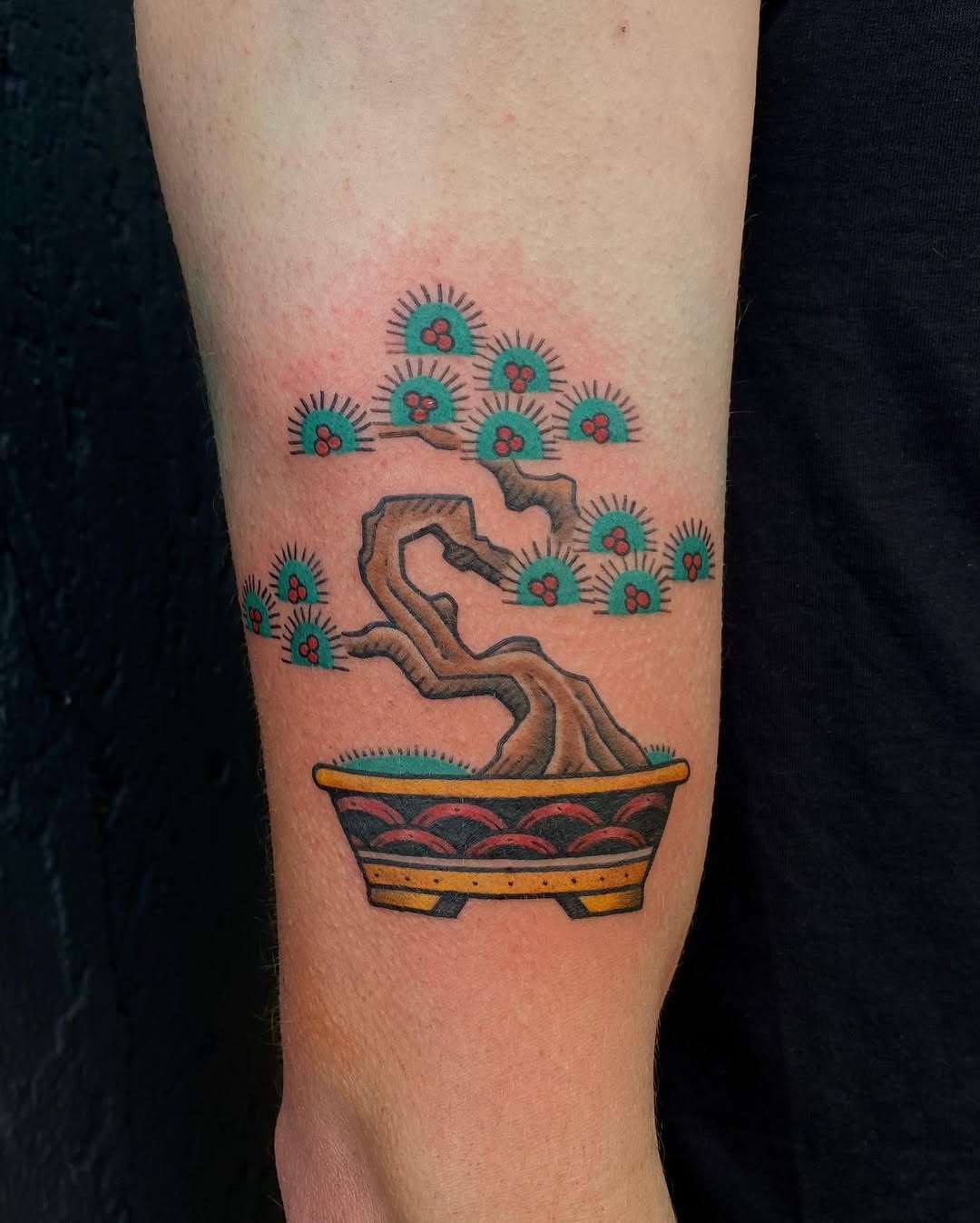 Elegant bonsai tattoo showcasing artistic intricacy