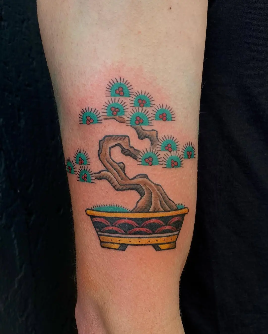 Elegant bonsai tattoo showcasing artistic intricacy