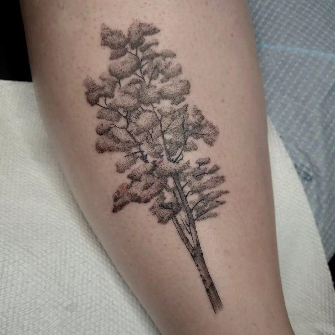 Elegant birch tree tattoo for nature lovers