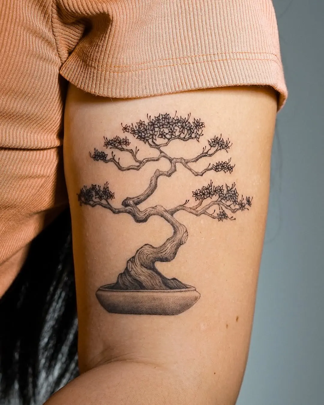Elegant bonsai tree tattoo with intricate details