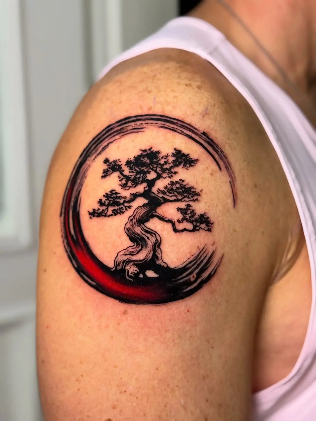 Stylized bonsai tree in circular design