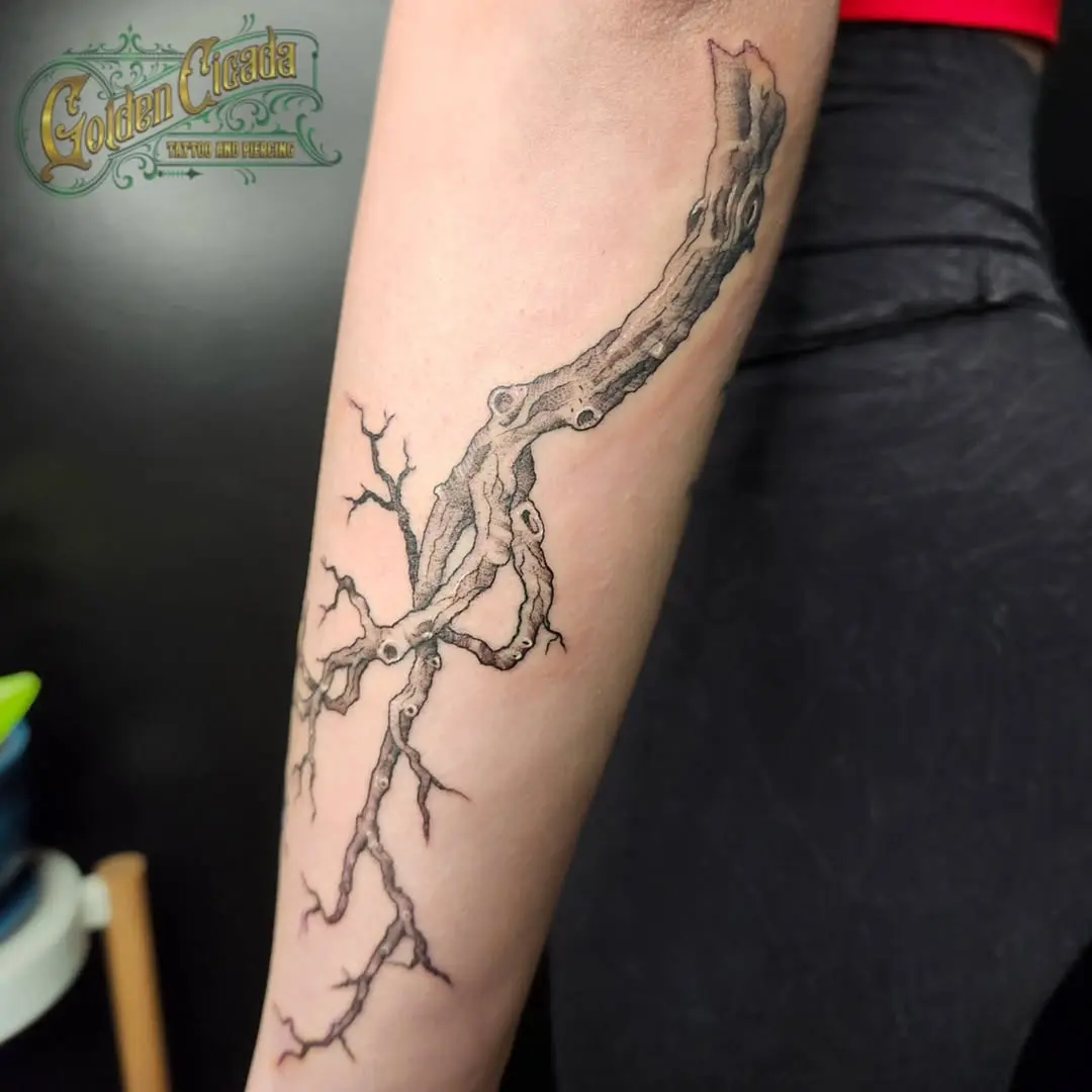 Intricate Branch Tattoo on Forearm
