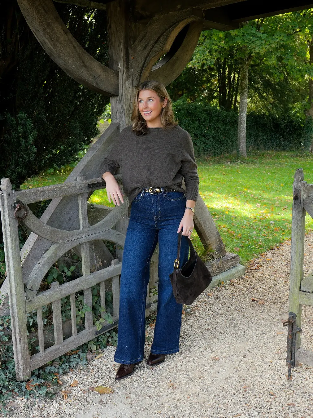 Chic flared jeans and cozy sweater look