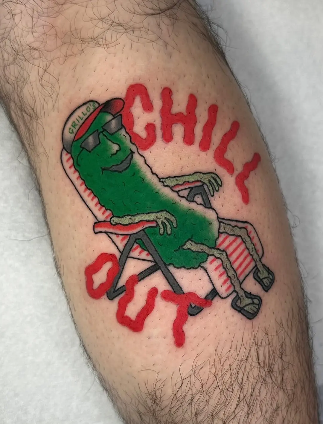 Playful pickle tattoo brings chill vibes
