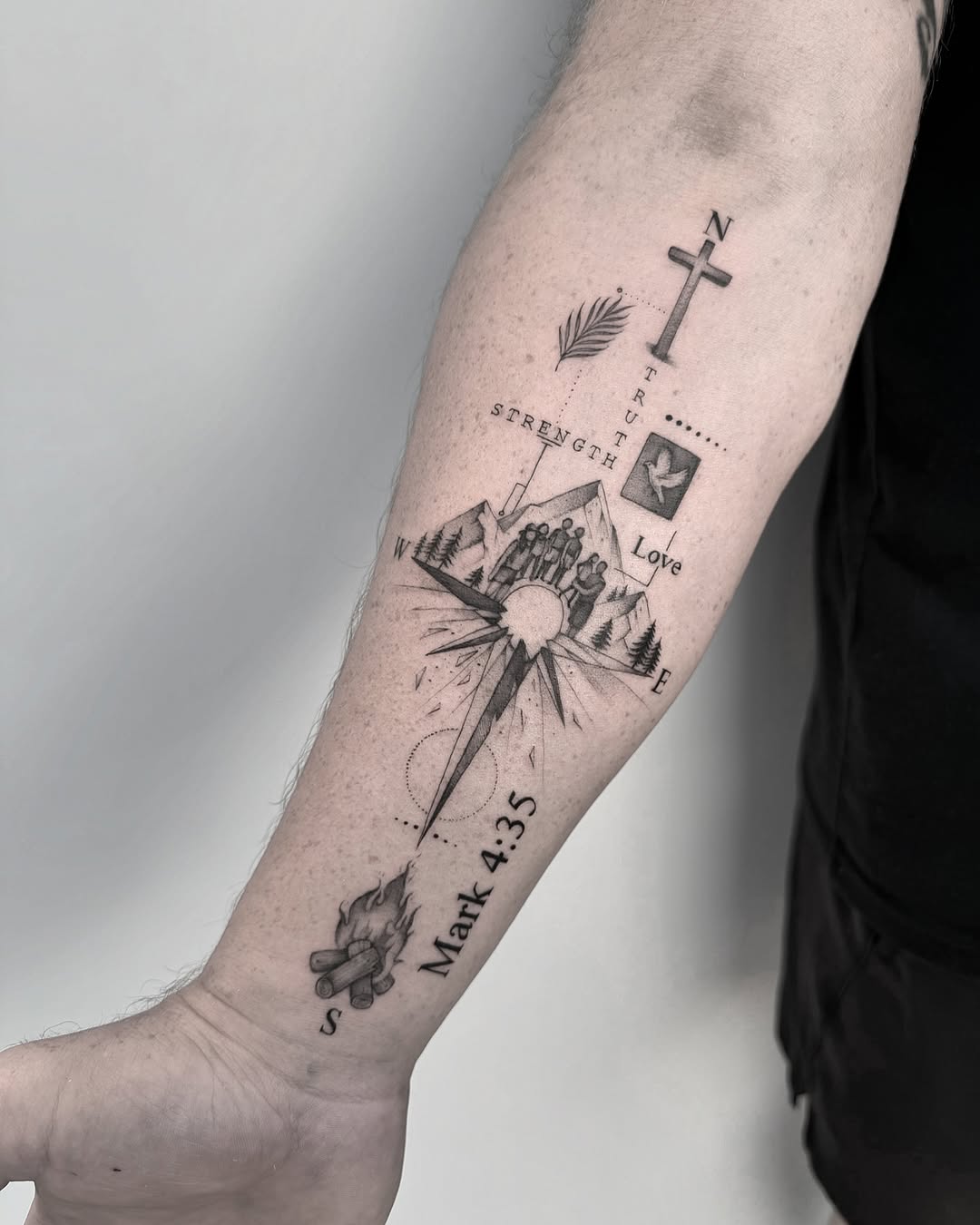 Symbolic Christian tattoo blending faith and nature