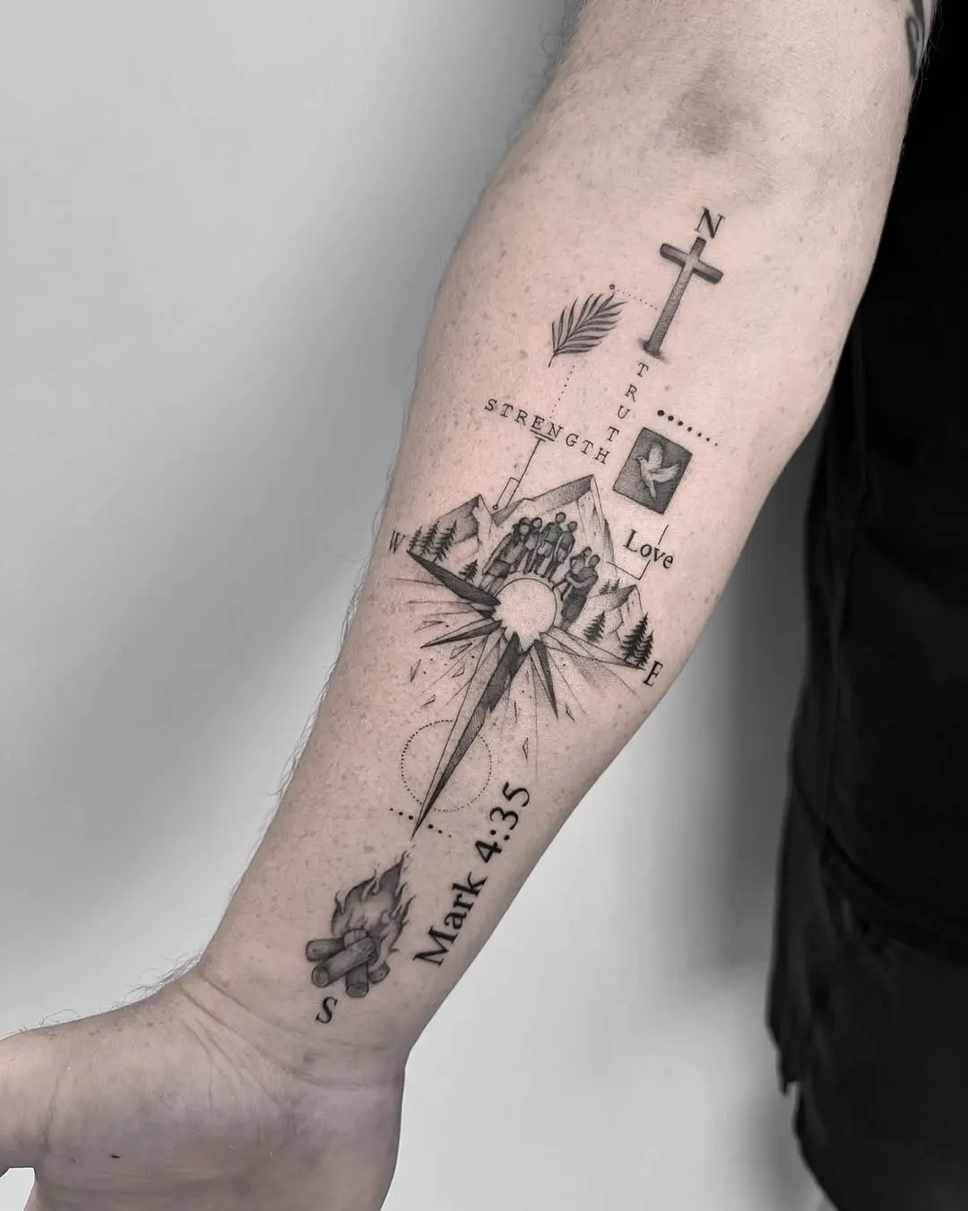 Symbolic Christian tattoo blending faith and nature