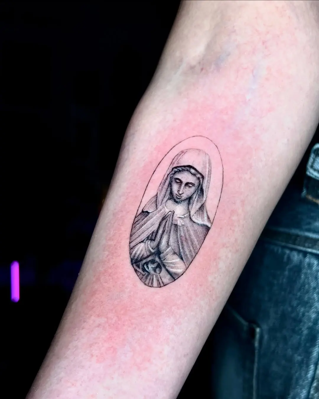A Serene Virgin Mary Prayer Tattoo