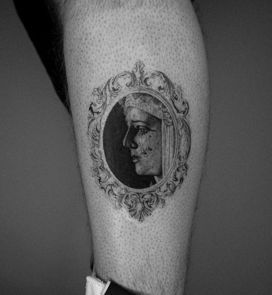 Intricate vintage portrait framed in tattoo design