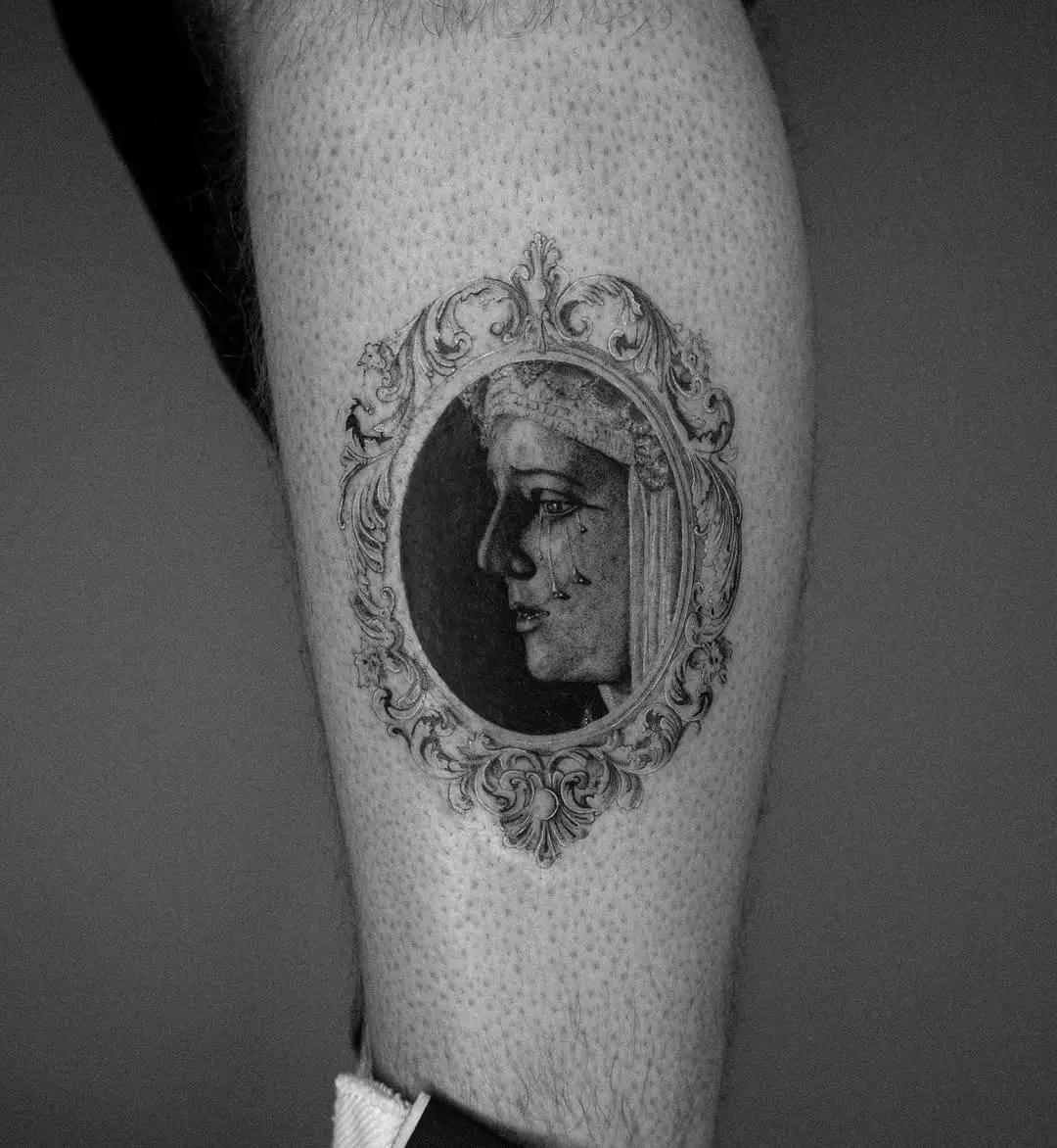 Intricate vintage portrait framed in tattoo design