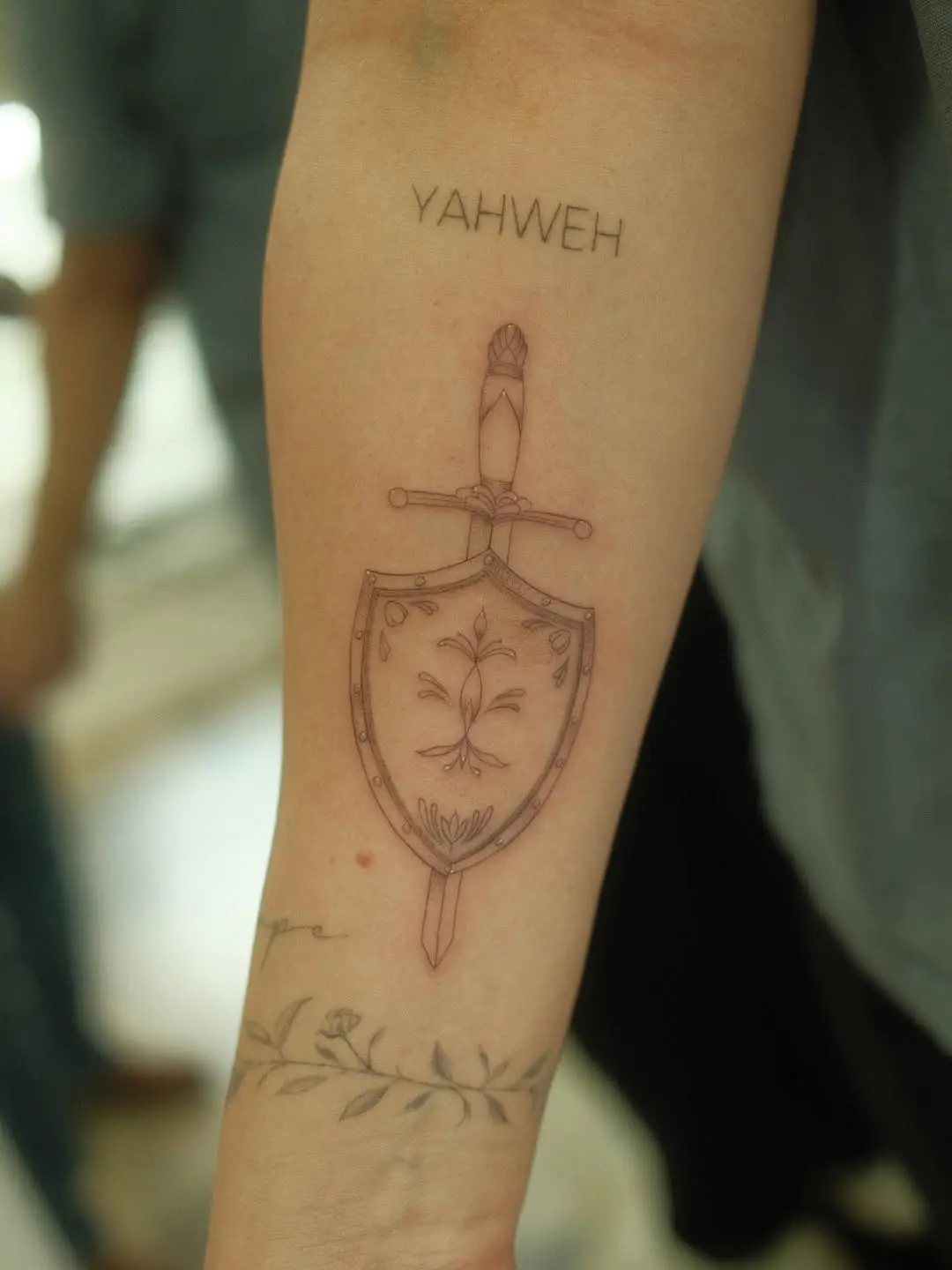 Faith-Inspired Shield Tattoo with Yahweh