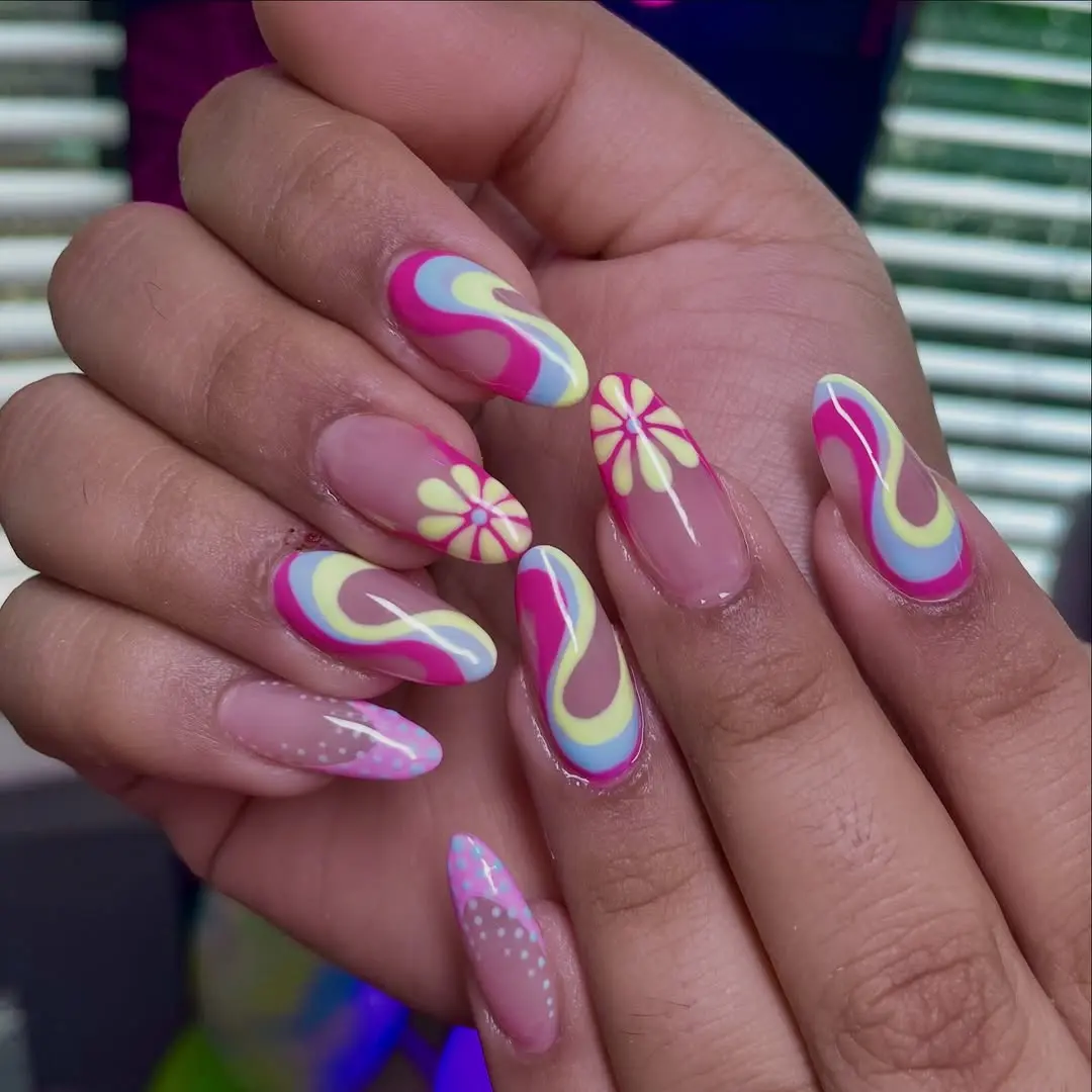 Playful, colorful nails with charming floral accents