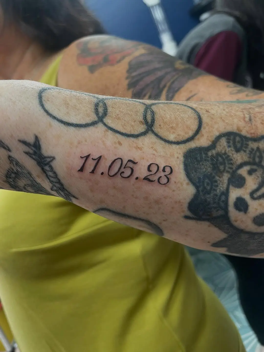 Stylish date tattoo inked on forearm