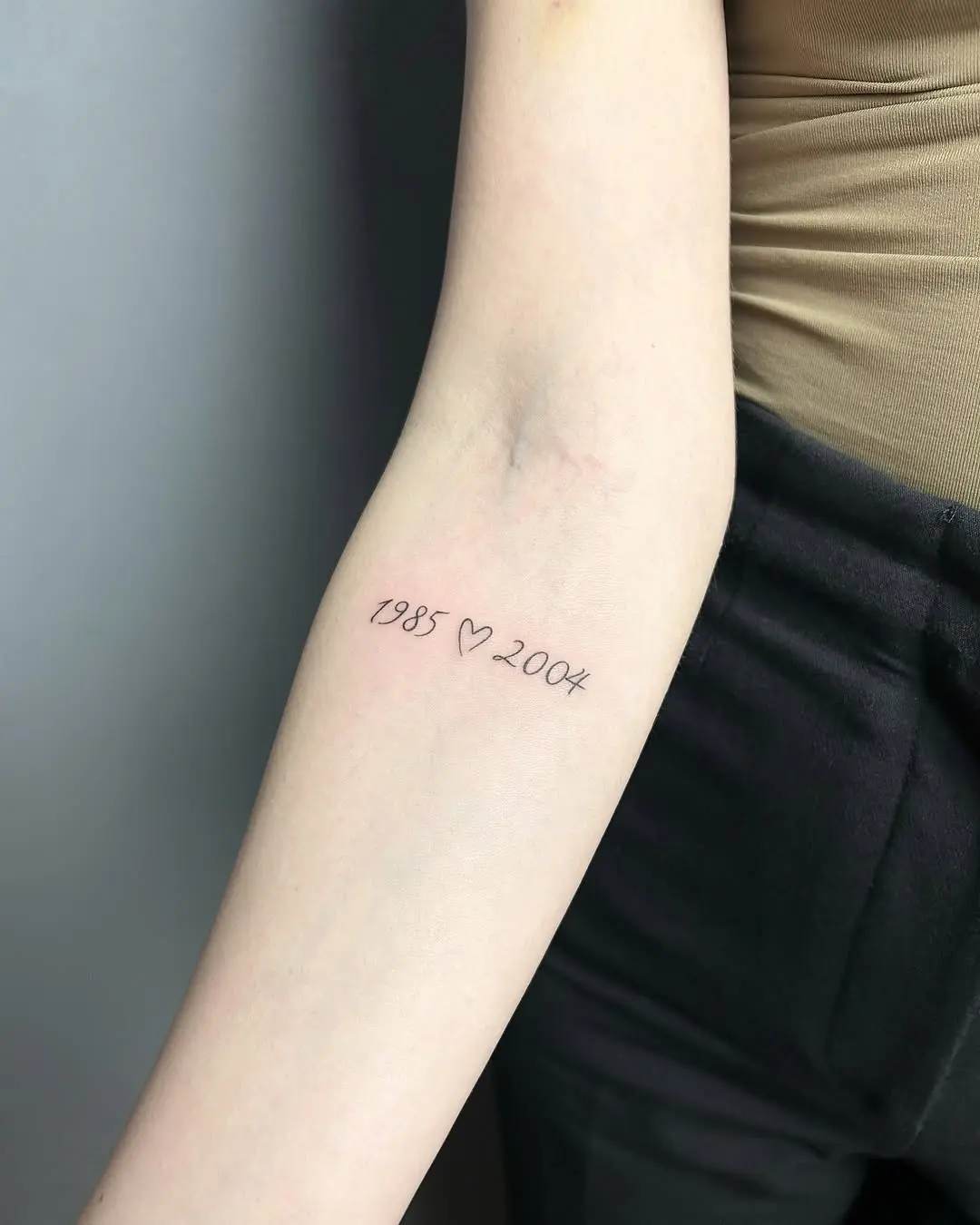 Minimalist Date Tattoo Celebrating Two Years
