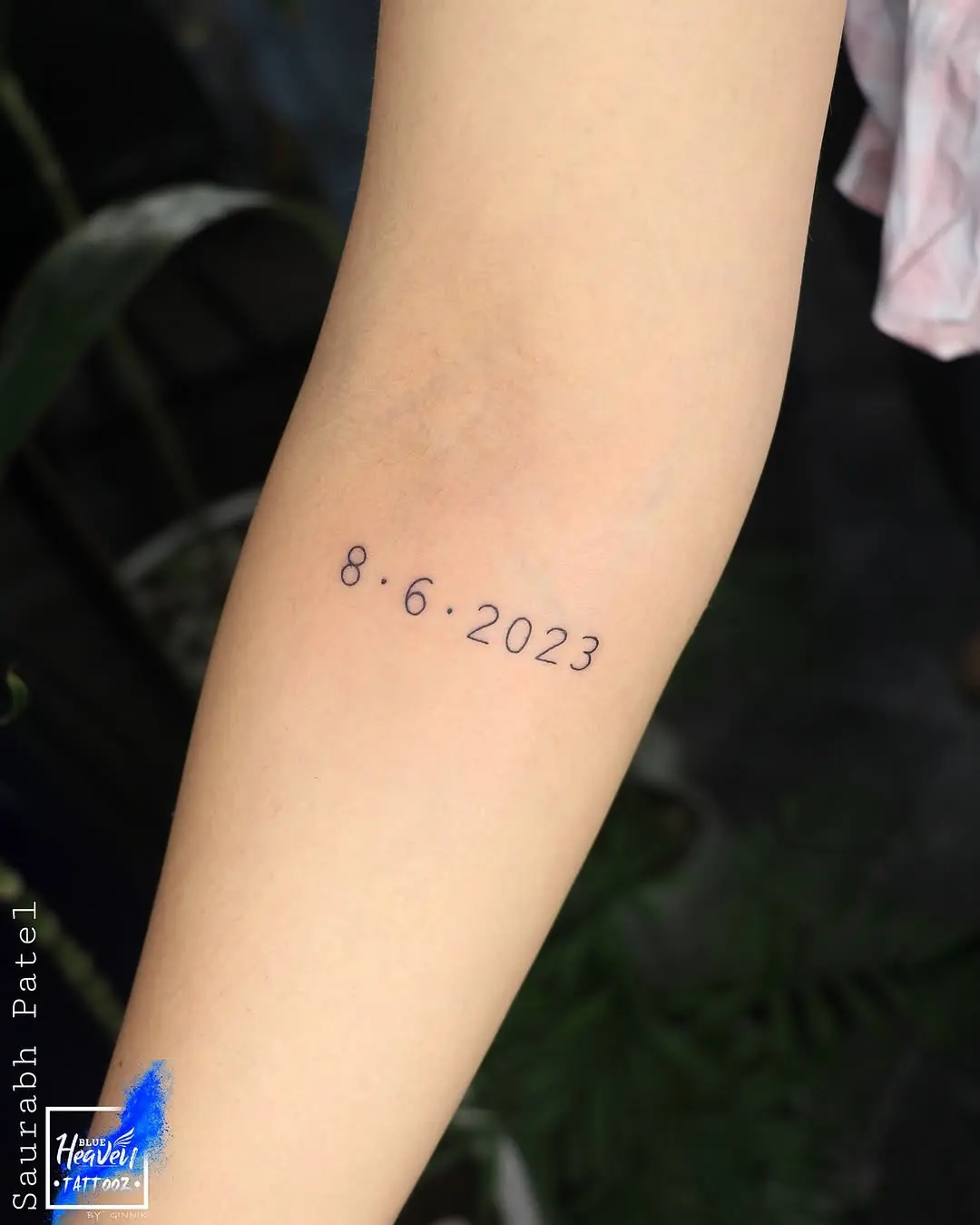 Meaningful date tattoo on the forearm