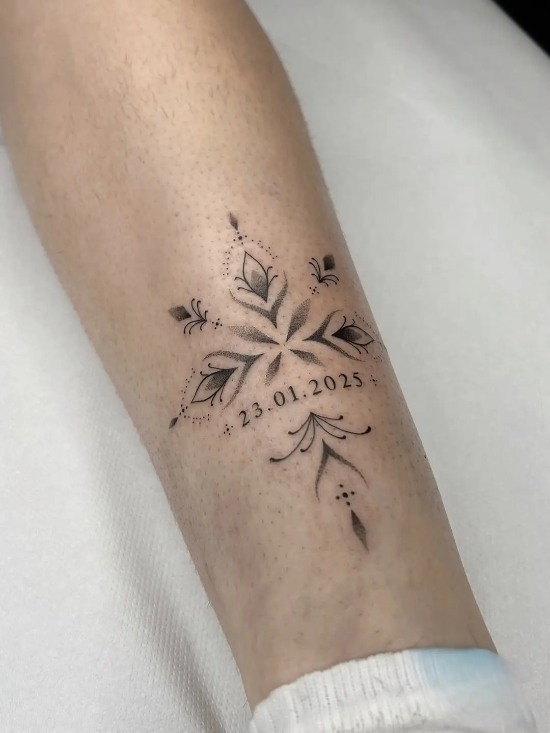 Elegant Date Tattoo with Floral Elements