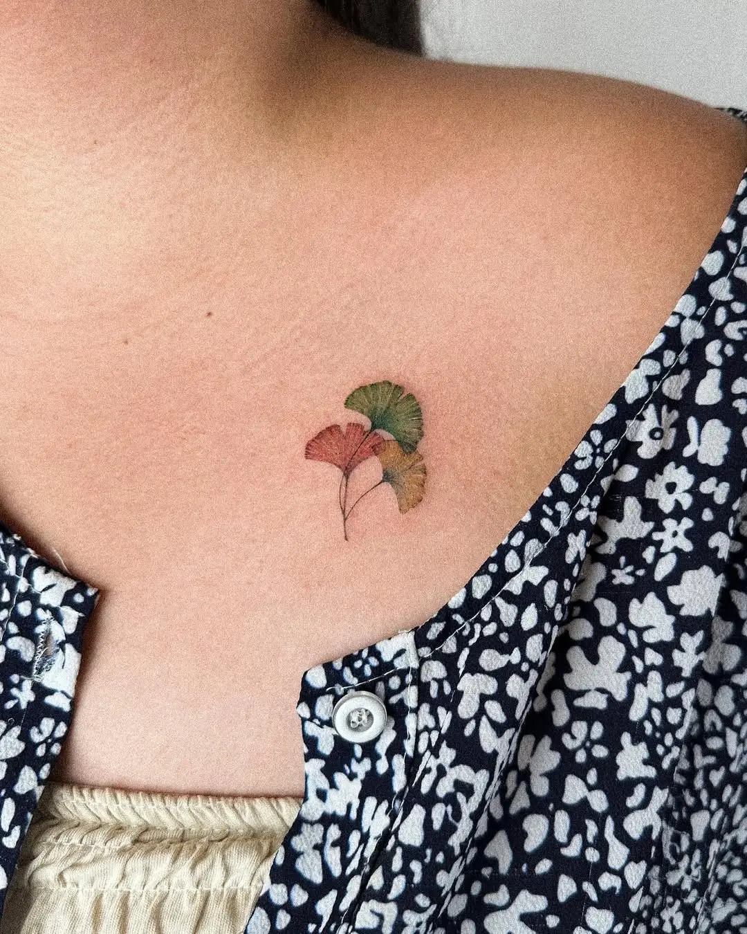Charming and delicate maple leaf tattoo design