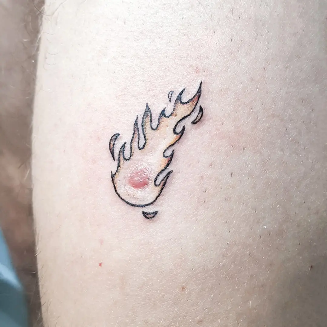 Stunning meteor tattoo with fiery details